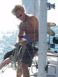 Our skipper reefs the mainsail.
